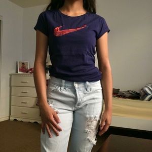 Navy blue and red Nike shirt